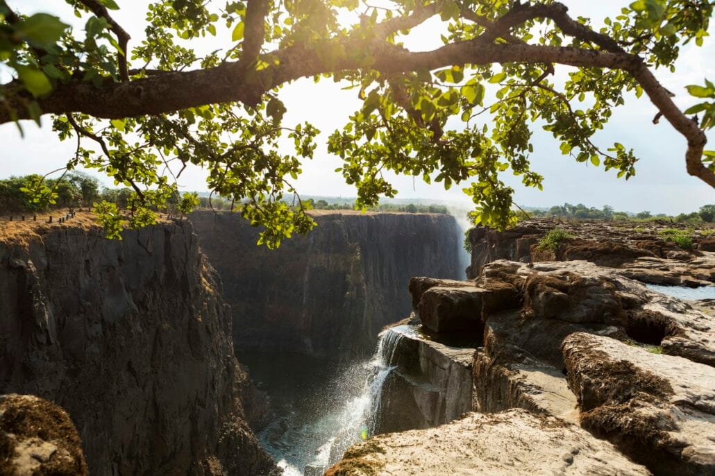 Victoria Falls from the Zambian side, view of the vertical cliffs of the river gorge.