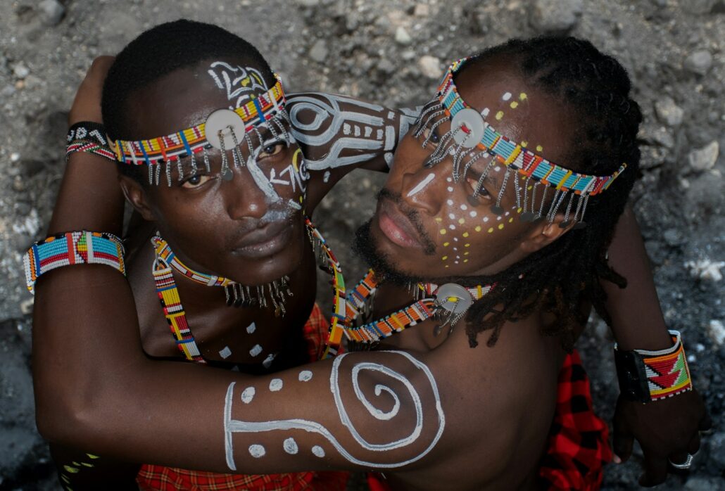 a couple of people with face paint on their faces